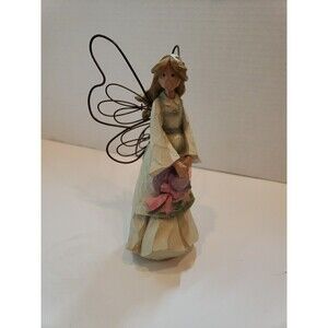 Angel Holding Her Spring Bonnet  7" HighGANZ Resin Wood Carving